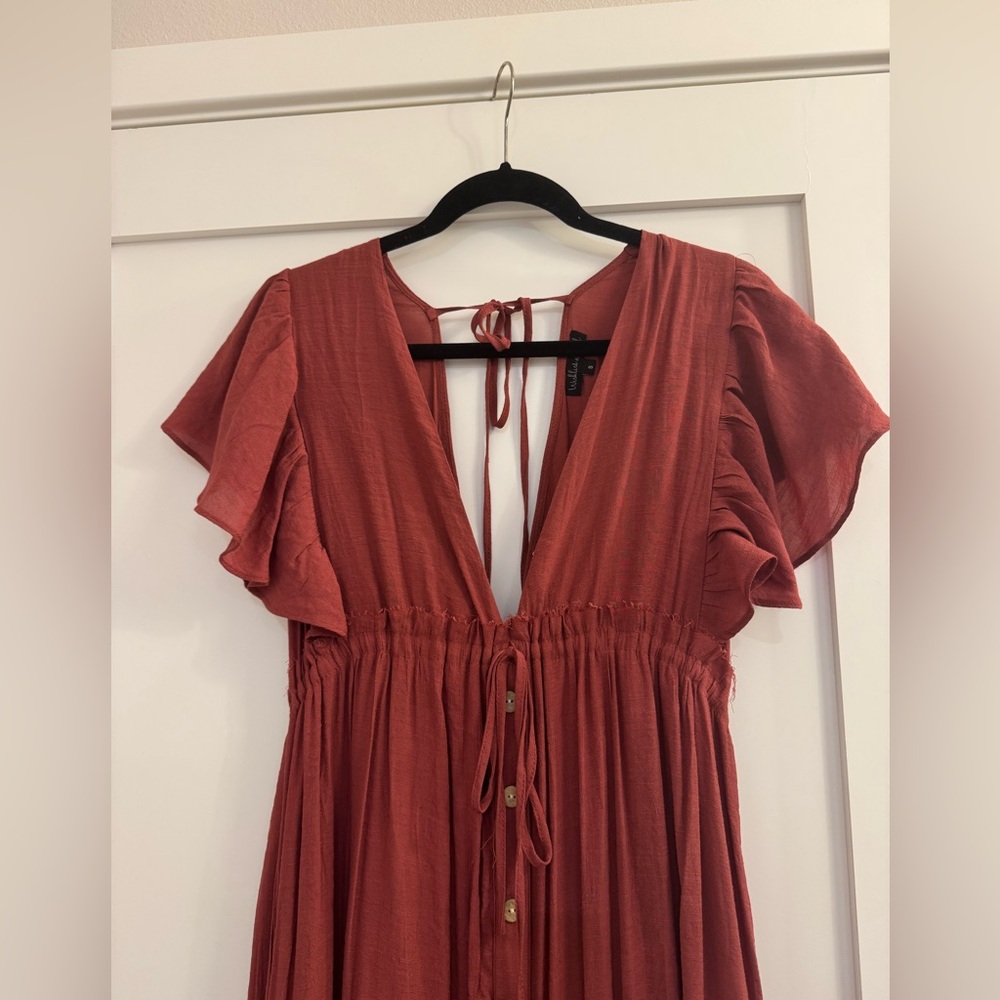 Wishlist beautiful flutter sleeve with plunge neck.
